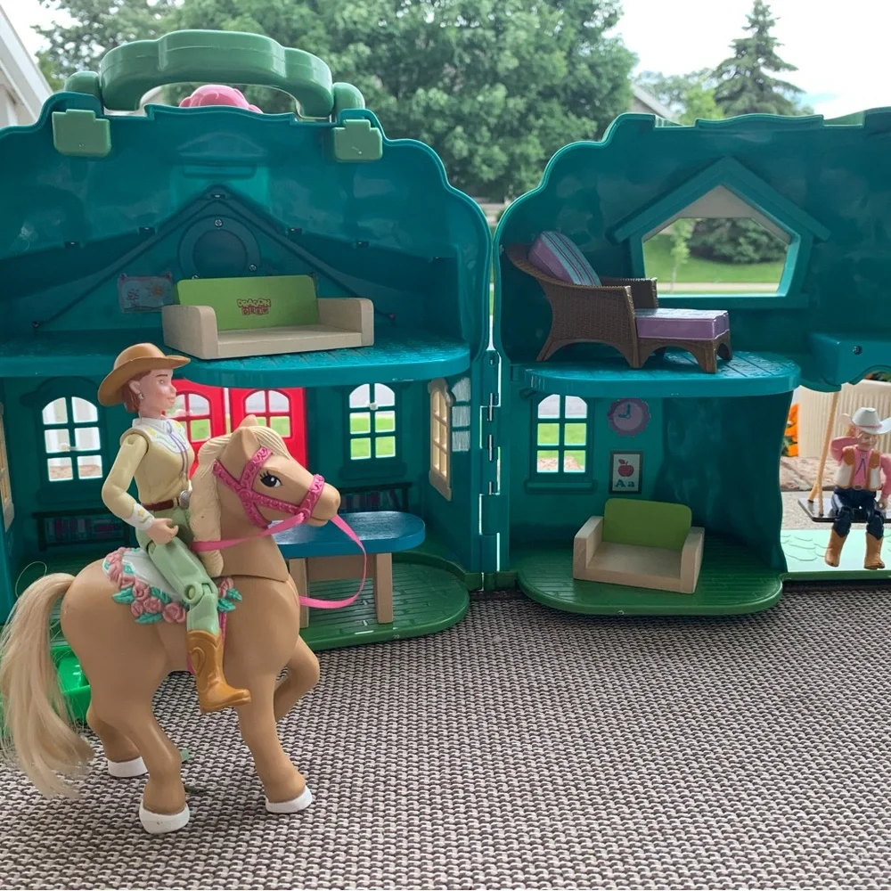 Cowgirl dolls, horse, house, and furniture playset